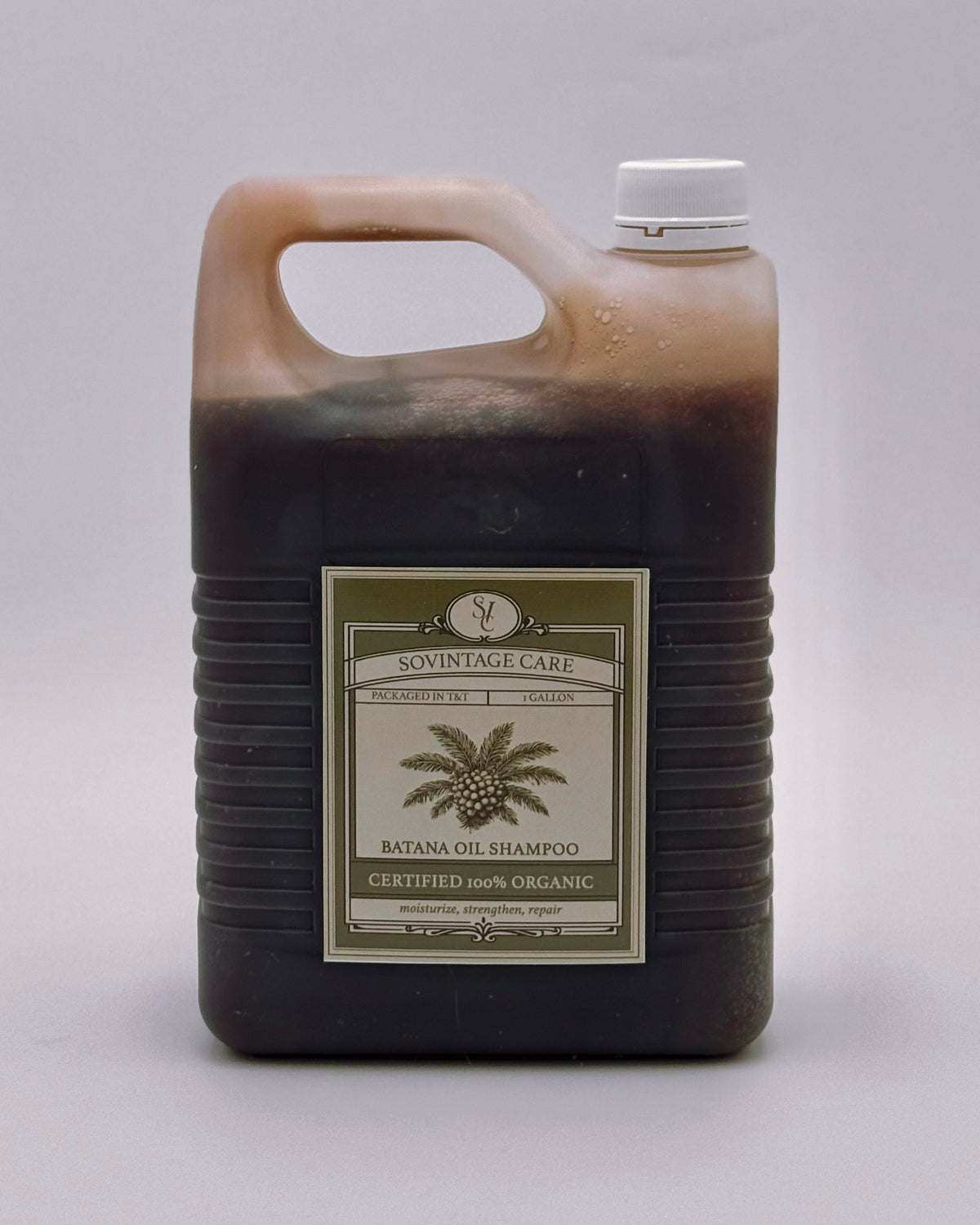 Sovintage Care Batana Oil Shampoo in a 1-gallon bottle, wholesale size, with a clear label showing the product name and brand.